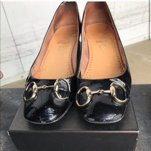 Gucci black patent low heel ballet slippers.